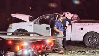Driver arrested after truck flips on Falls of Neuse Road in Raleigh