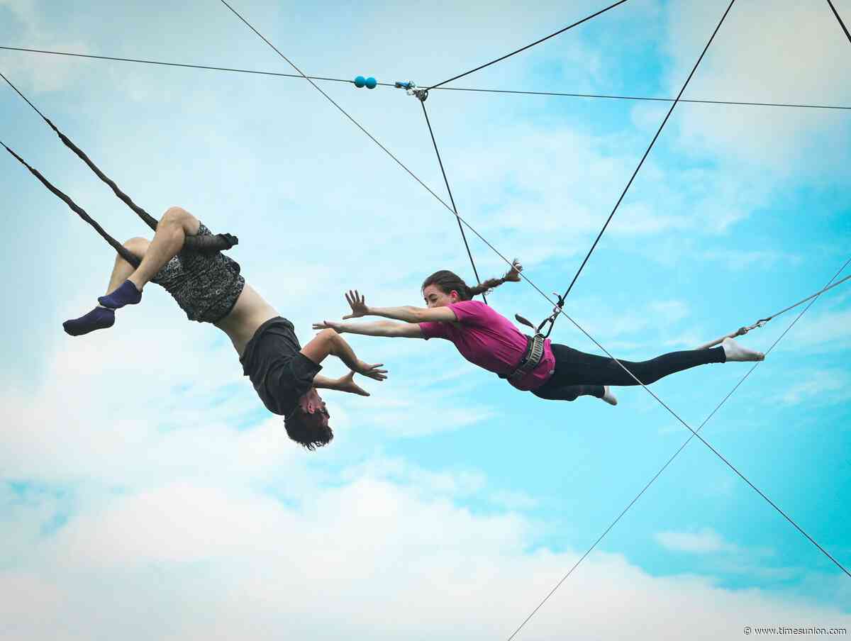 Photos: Performers teach the art of flying trapeze at Troy's Circus in the Park
