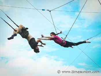 Photos: Performers teach the art of flying trapeze at Troy's Circus in the Park