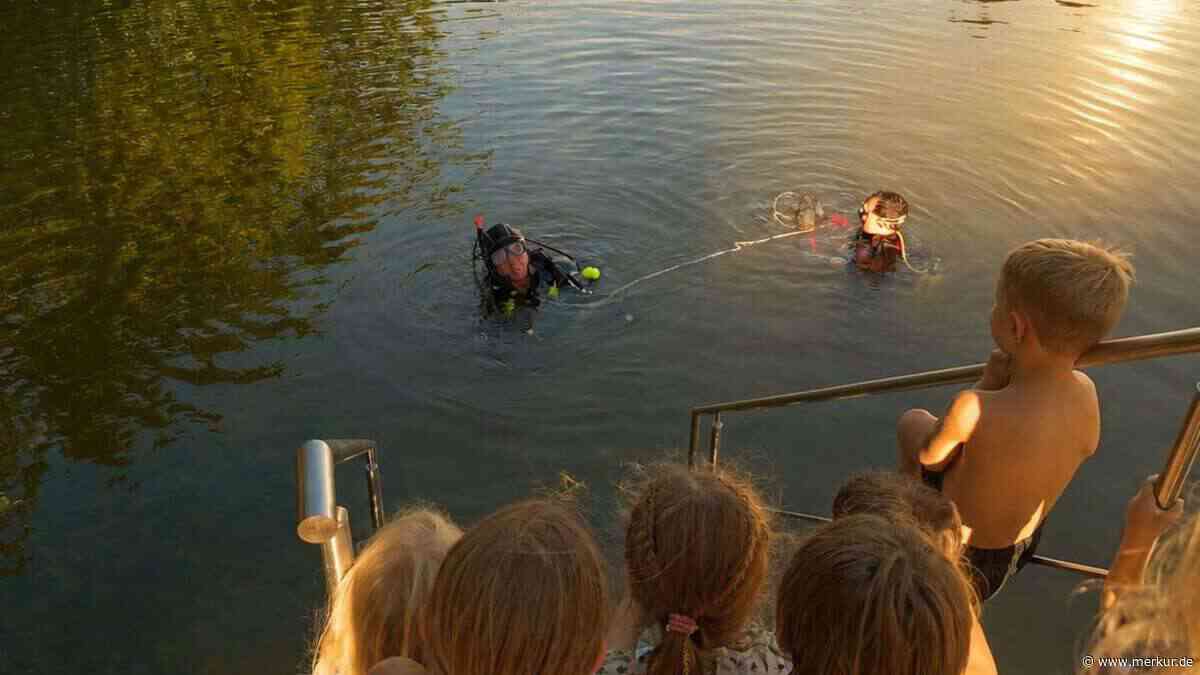 Handy im Klostersee untergegangen: Wasserretter tauchen ab – Kinder verfolgen Einsatz