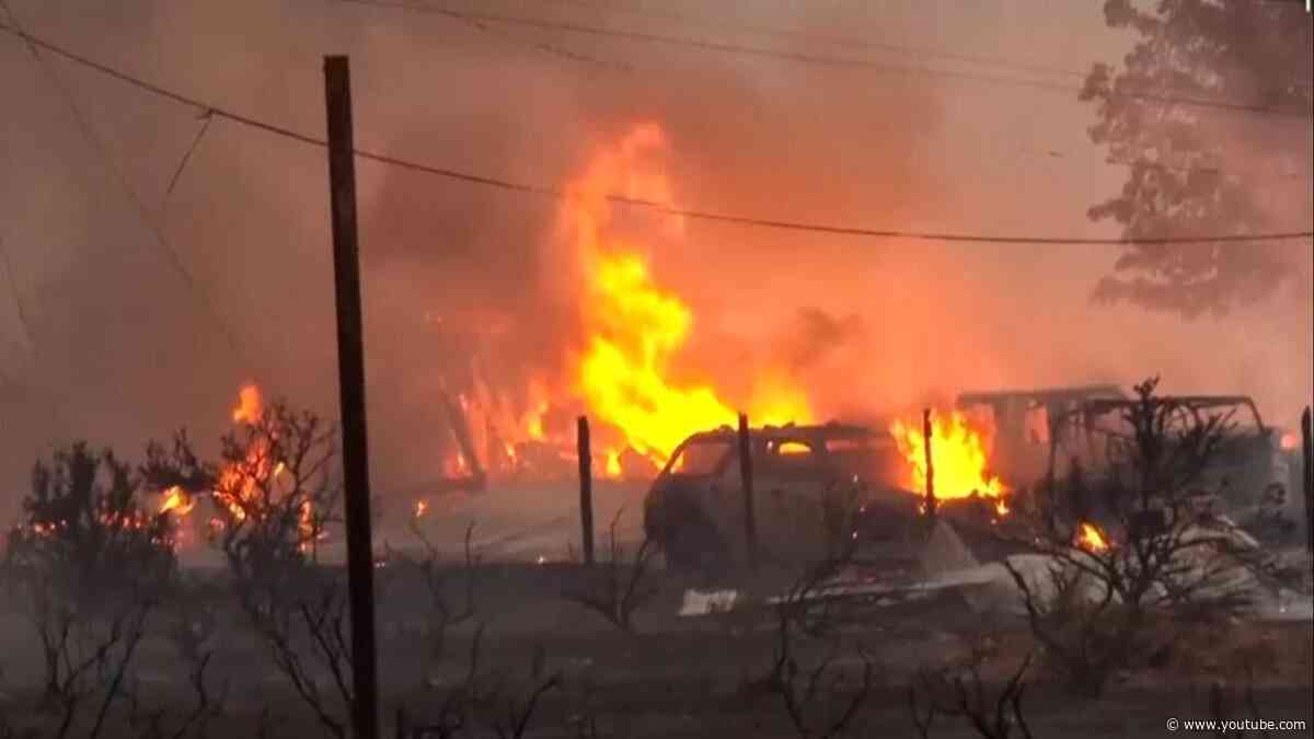 Wildfire burns out of control in Reno as thousands evacuate