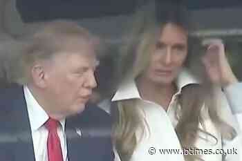 Video Shows Serious-Looking Trump-Melania Exchange at Grand Prix as Natalie Harp Speculation Grows