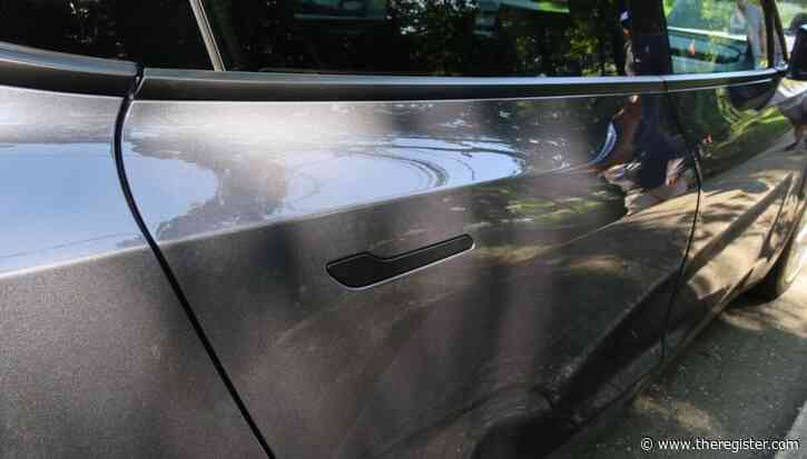 Tesla to recall almost three million vehicles over hidden door handles