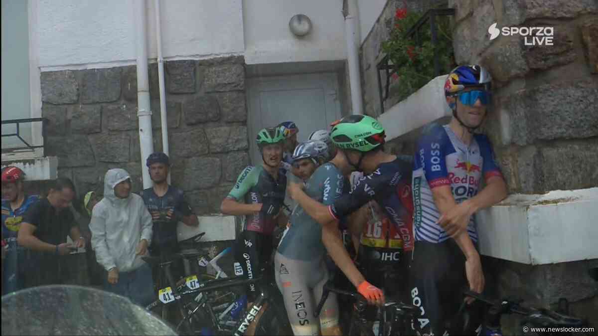 Vuelta-rit definitief gestaakt na ongekend hondenweer: bibberende renners schuilen voor hagelstenen