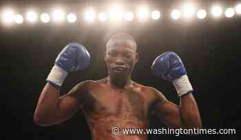 South African police arrest 4 in the killing of former champion boxer Zolani Tete