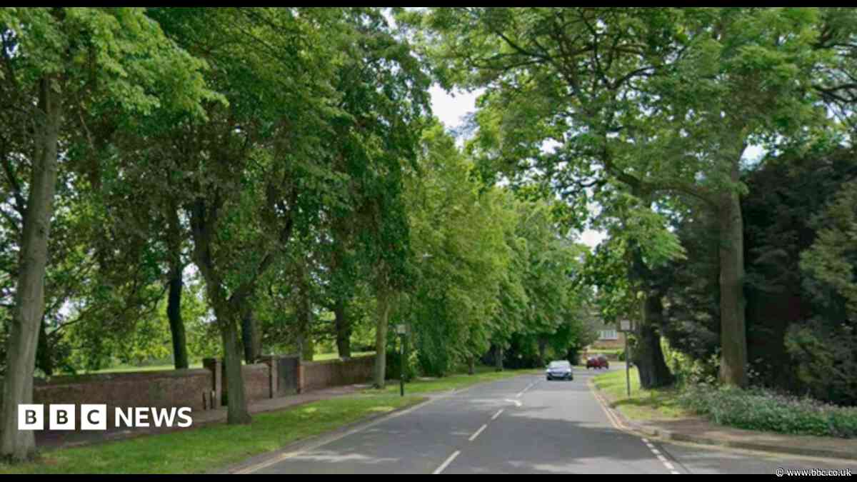 Man arrested after car crashes into wall