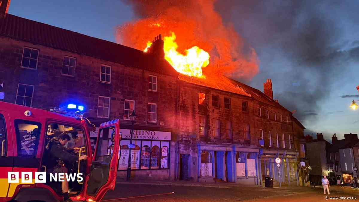 Teenagers arrested over fire at building
