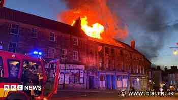 Teenagers arrested over fire at building