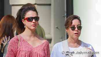 Margaret Qualley puts on leggy display in pink dress as she joins Aubrey Plaza and her newborn for NYC stroll