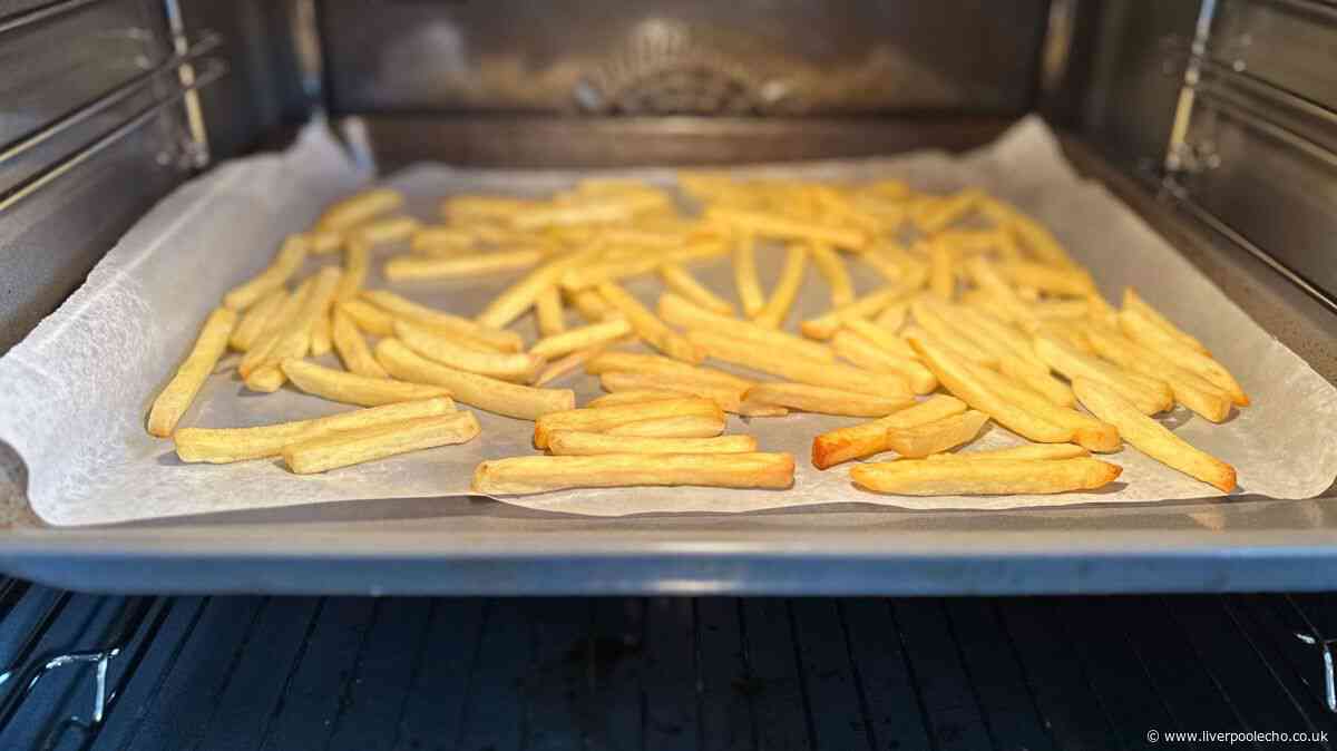 Frozen oven chips will be tastier when coated in a simple mix before cooking