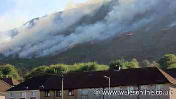 Deep anger as fire crews deal with more raging wildfires that have come close to homes and shut roads - live updates