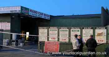 LIVE updates as police cordon remains at Beddington Lane car wash after major response