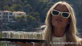 Love Island's Molly Smith carries a tray of shots and shares videos of her boozy wedding party after police were called to day two of her raucous celebrations with Tom Clare