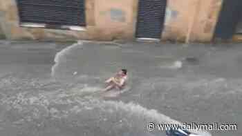 Freak storms spark flooding chaos in Spanish tourist town with motorists swept down streets
