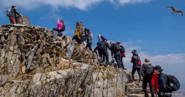 ‘I would never:’ Hikers divided over queues on Wales’ highest mountain