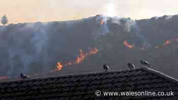 Crews continue to battle wildfires in Maerdy and elsewhere as anger grows - live updates
