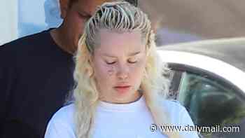 Amanda Bynes flaunts Ozempic weight loss in miniskirt as she surfaces after reacting to death of fellow child star Hayden Panettiere