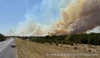 Evacuations ordered in rural Texas as wildfire mushrooms within hours