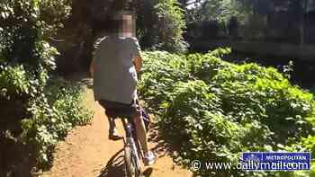 Moment police officer borrows man's bicycle to chase down alleged thief through the streets