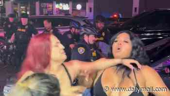 Pandemonium as women spill out of skimpy leotards during massive brawl at taco restaurant