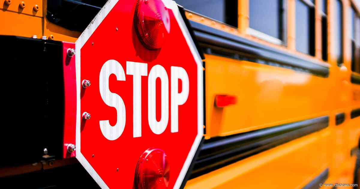 Driver dies after crashing into parked school bus in Cherokee County; 22 students reported safe