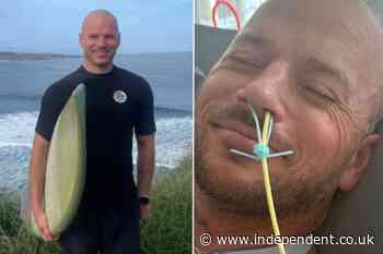 Surfer paralyzed after he dove into a wall of sand to save kid caught in California riptide