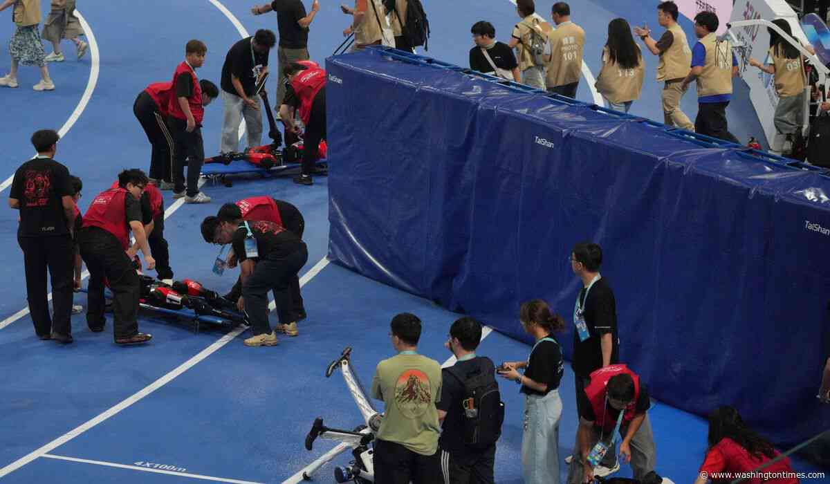 A Chinese humanoid robot sets a new 100-meter sprint record at Beijing Games