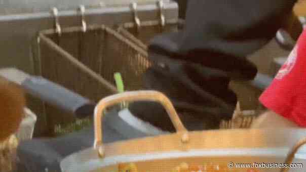 Panda Express guest stunned as employee stands on fryer while cleaning