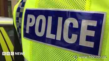 Man arrested after woman found dead in caravan