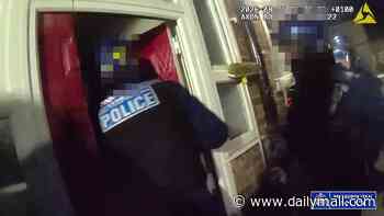Watch the moment armed police use circular saw to break down suspected knife smuggler's door in dawn raid