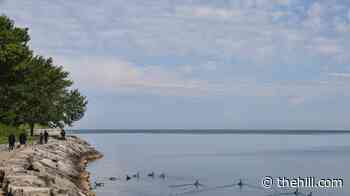 'Lake America'? Who is responsible for naming geographic places?