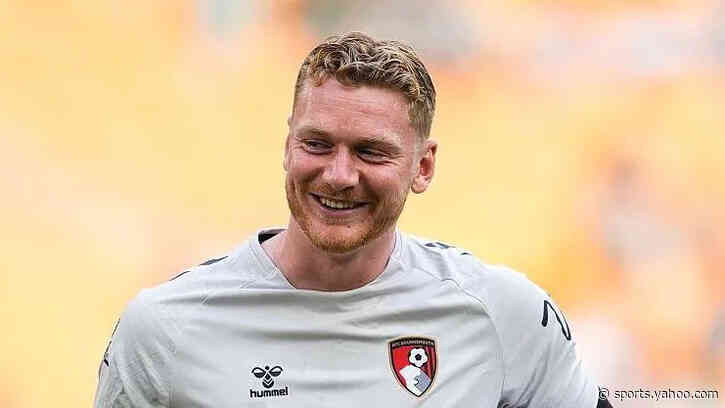MK Dons sign goalkeeper Dennis from Bournemouth