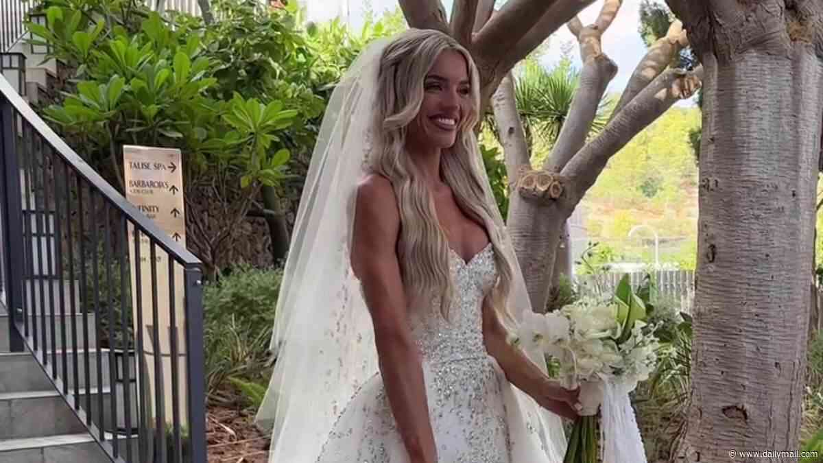 Love Island star Molly Smith's proud dad wipes away tears as he sees her wedding dress for the first time in emotional video