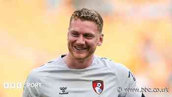 MK Dons sign goalkeeper Dennis from Bournemouth