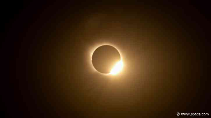 A black star in a false Spanish twilight: Here's the story of my 1st total solar eclipse