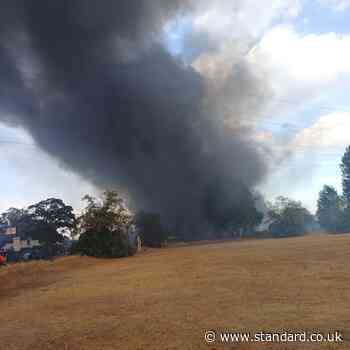 Mitcham fire: 125 firefighters battle huge blaze in south London