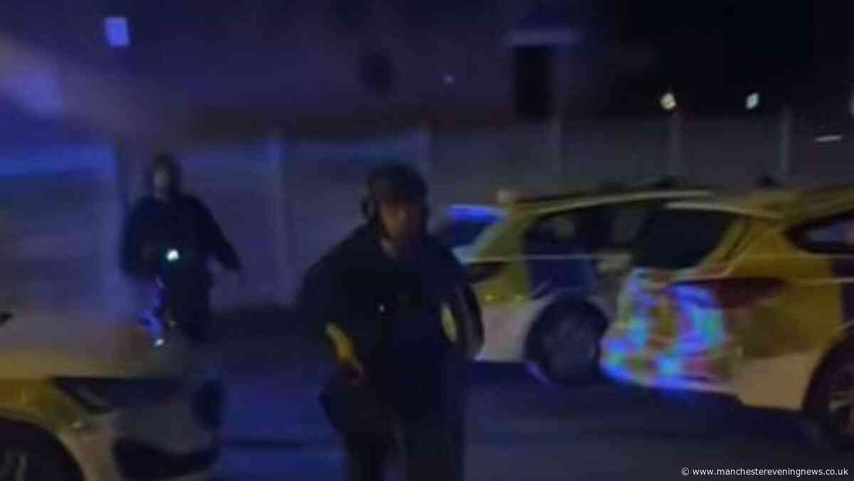 Armed police swarm Oldham estate following reports of 'serious assault'
