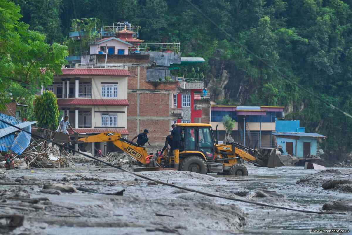 Rescuers search for dozens of Britons among those missing in Nepal after floods