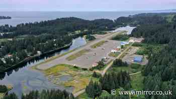Plane plummets into Alaska lagoon in horror crash as 'people trapped in aircraft'