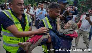 At least than 550 missing in Tibet floods, hundreds missing in Nepal