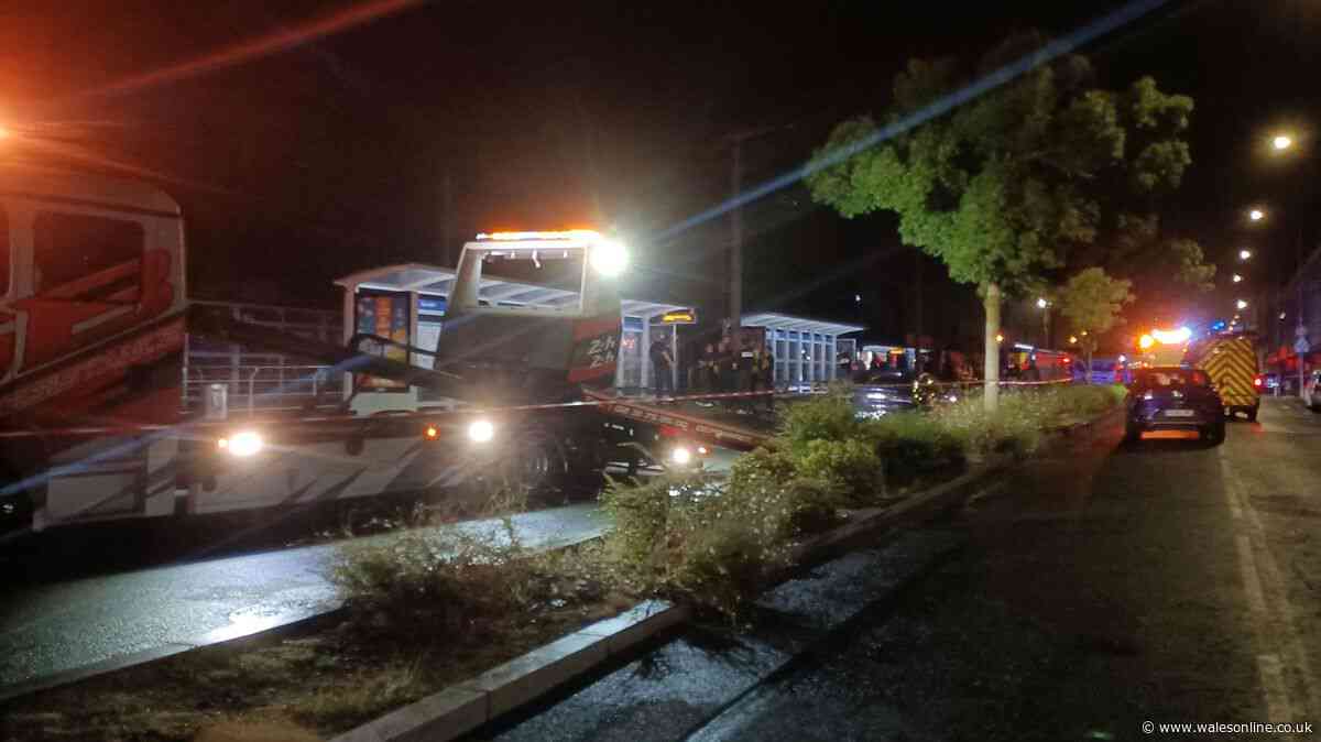 Person killed and others critical after car rams into crowd outside busy train station