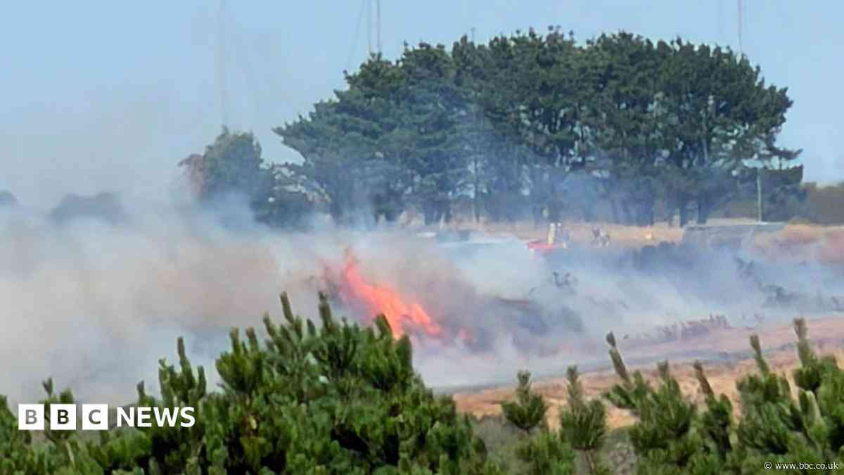 Digger driver helps tackle 'dangerous' wildfire