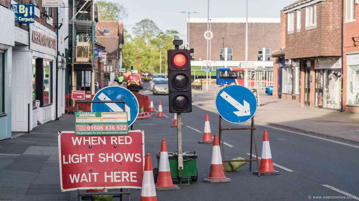 Lawyer explains what to do if temporary traffic lights won't change from red