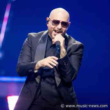 Pitbull says Dolly Parton 'believed in me when a lot of folks didn't' in moving tribute