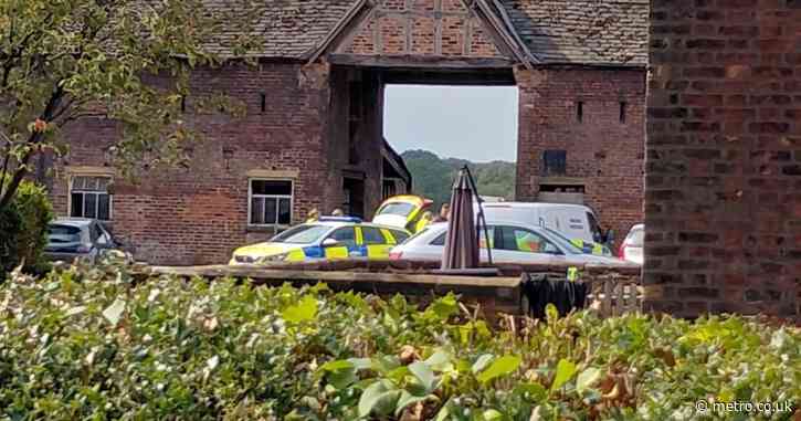 Two men die after falling into an industrial silage tank at a farm