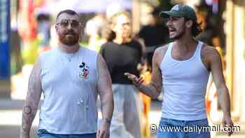 Sam Smith and fiancé Christian Cowan twin in white vests as the couple are seen together for the first time since confirming their engagement
