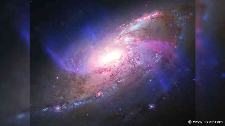 Glowing galaxy with anomalous extra arms | Space photo of the day for Aug. 27, 2026