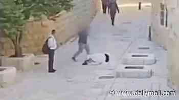 Jewish man who repeatedly kicked a nun in Jerusalem attack is acquitted on mental health grounds and will spend six years in psychiatric hospital