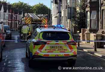 Arson charge after blaze at home closes road