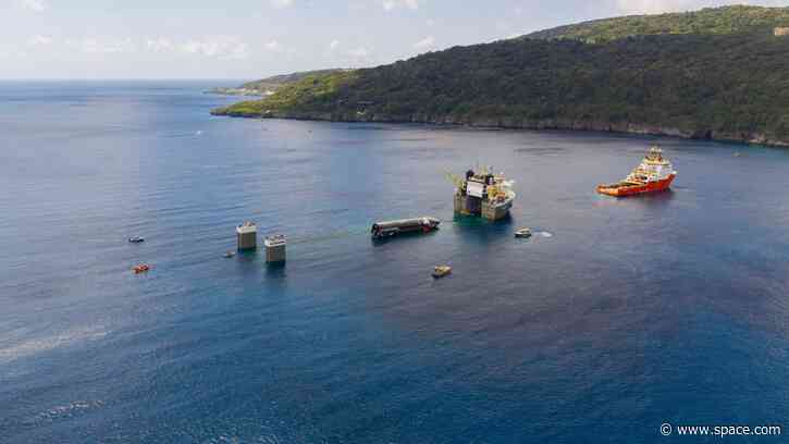 Starship is coming home! SpaceX loads floating spacecraft onto huge ship in the Indian Ocean (photos)